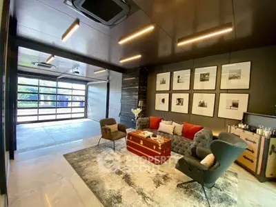 Luxurious modern living room with stylish furniture and elegant decor, featuring a spacious open layout and natural light.
