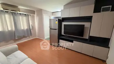 Modern living room with sleek entertainment center and cozy ambiance