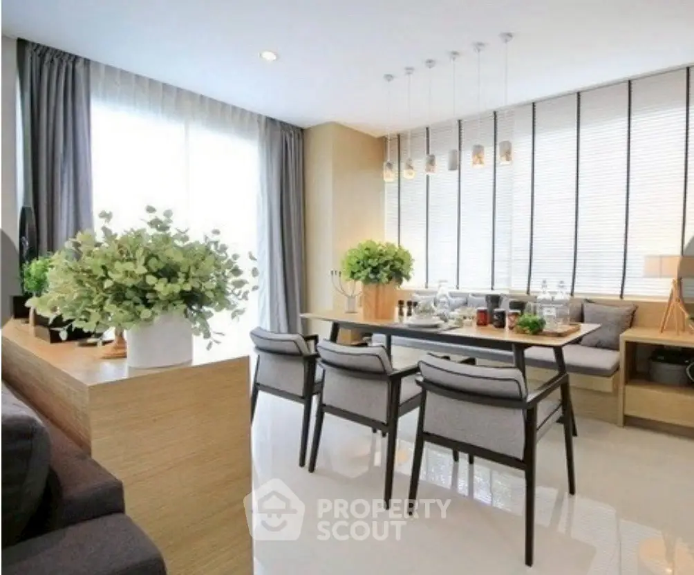 Modern dining area with elegant decor and natural light