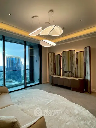 Luxurious living room with panoramic city view and modern lighting