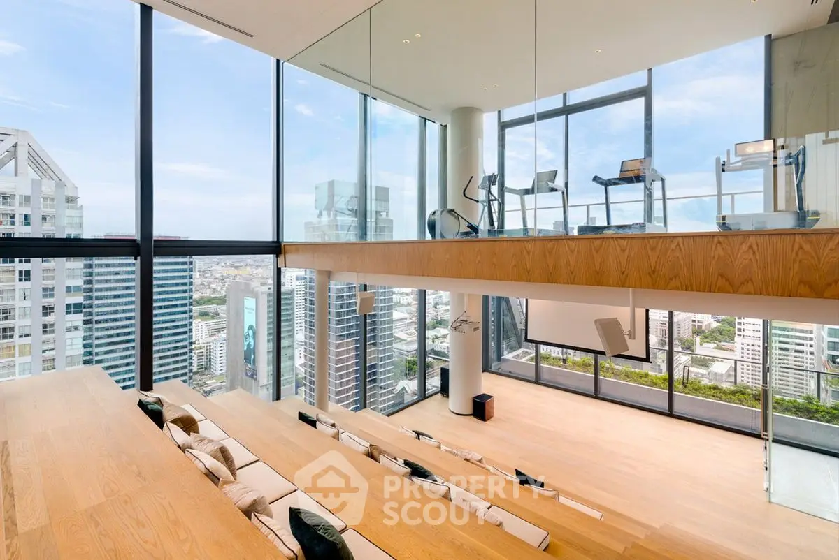 Stunning modern loft with floor-to-ceiling windows and city skyline view