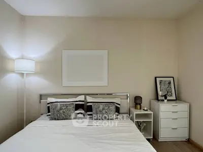 Cozy bedroom with modern decor and stylish lighting