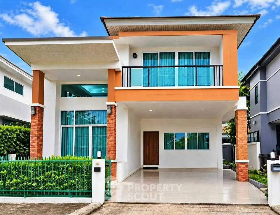 Modern two-story house with spacious driveway and stylish facade in a suburban neighborhood.