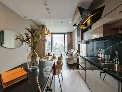 Luxurious open-plan kitchen and living room with city view, modern decor, and sleek finishes.