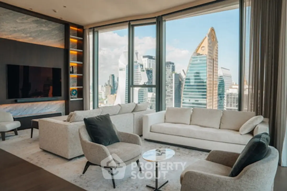 Luxurious living room with stunning city view and modern furnishings.