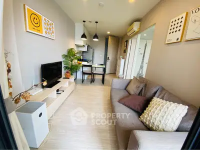 Modern living room with stylish decor and open kitchen layout