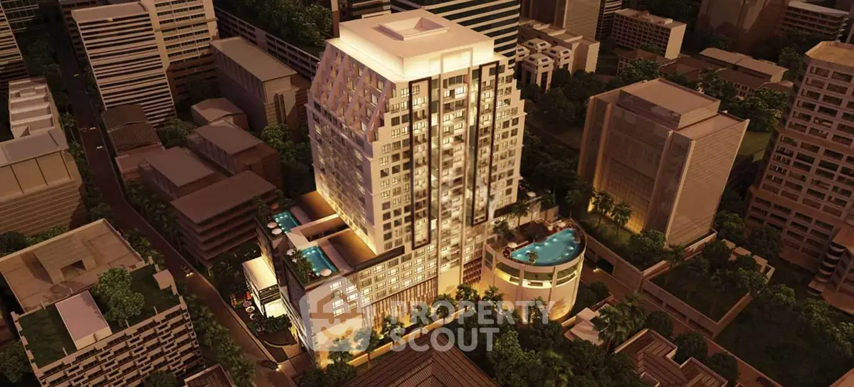 Luxurious high-rise building with stunning rooftop pool and cityscape view at night.