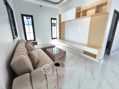 Modern living room with sleek furniture and natural light