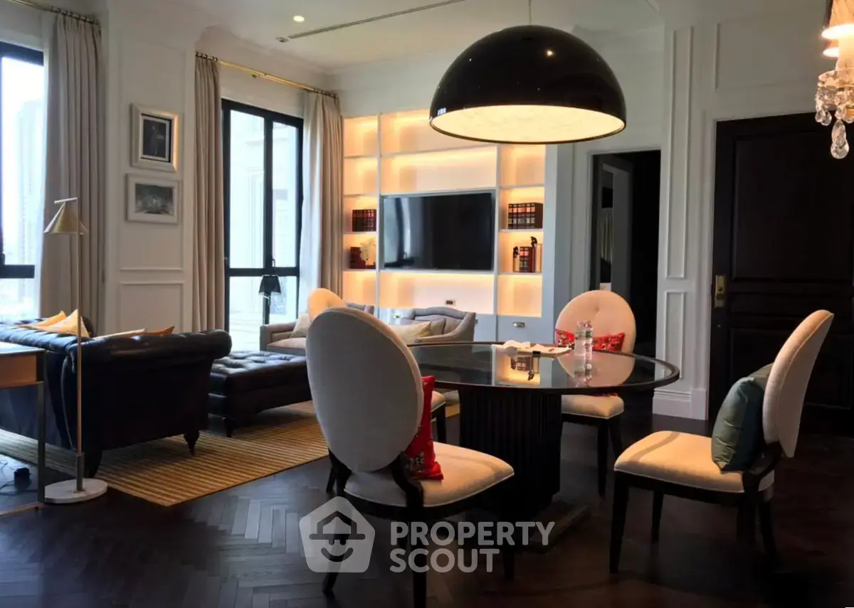 Luxurious living room with elegant dining area and modern lighting