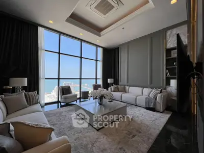 Luxurious living room with panoramic ocean view and elegant decor