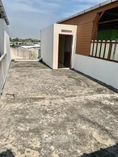 Spacious rooftop area with potential for customization and stunning views.