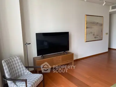 Modern living room with sleek TV and stylish decor