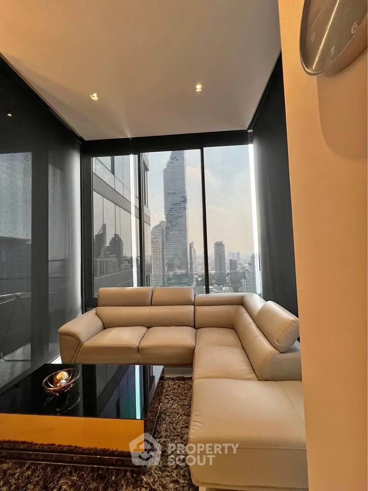 Luxurious living room with stunning city view and modern leather sofa
