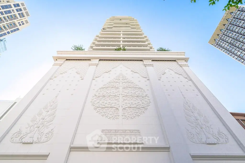 Stunning architectural facade of a modern high-rise building with intricate design details.