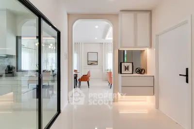 Modern open-plan living area with sleek design and elegant furnishings