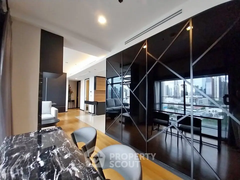 Luxurious modern apartment with stunning city view and elegant interior design.