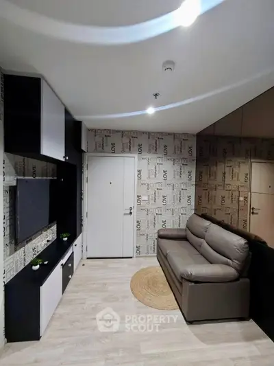 Modern living room with stylish wallpaper and sleek furniture design