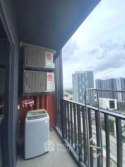 Modern balcony with washing machine and city view, perfect for urban living.