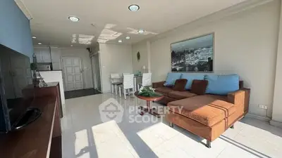 Spacious living room with modern furniture and natural light