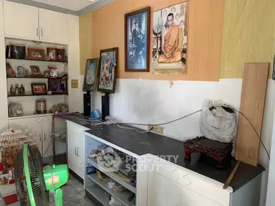 Cozy interior space with built-in cabinets and decorative elements, ideal for personalizing your home.