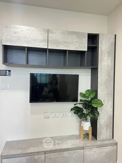 Modern living room with sleek TV unit and stylish decor