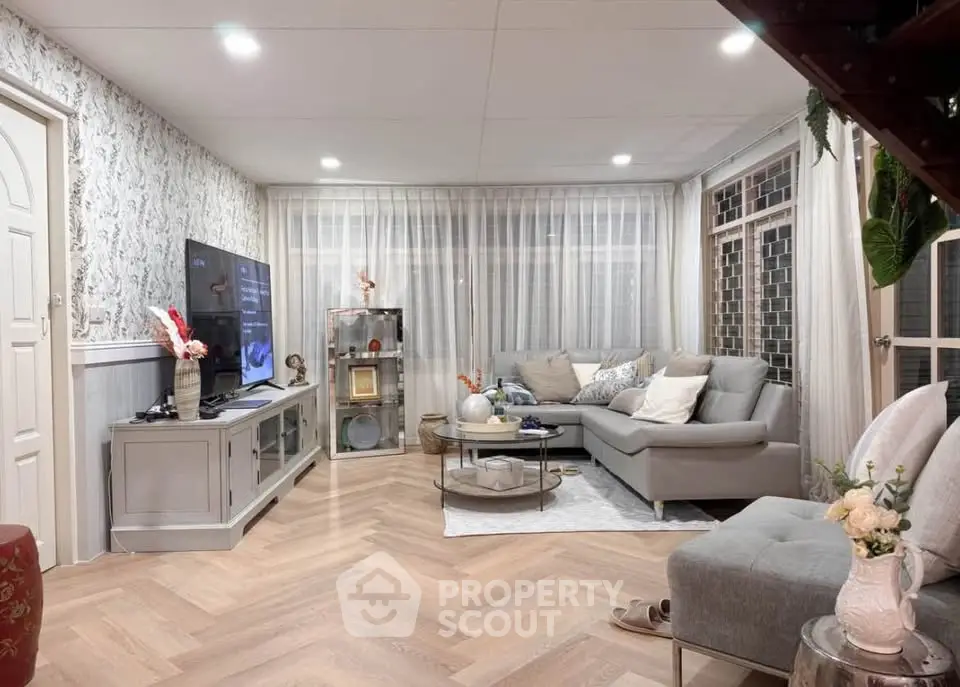 Charming living room with cozy sectional sofa and elegant decor