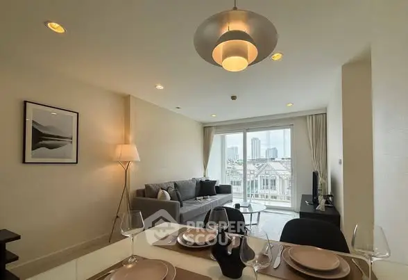 Modern living room with elegant dining area and city view