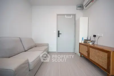 Modern minimalist living room with sleek furniture and neutral tones