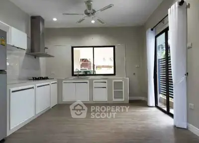 Spacious modern kitchen with open layout and natural light