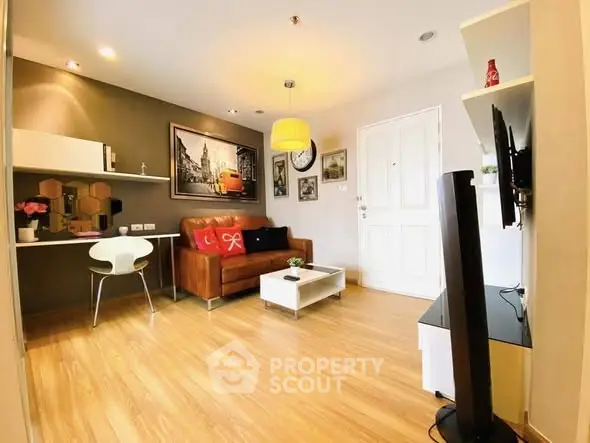 Stylish modern living room with wooden flooring and chic decor