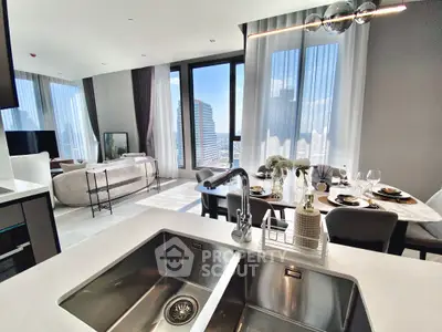 Luxurious open-plan living room with city view, modern furnishings, and elegant dining area.