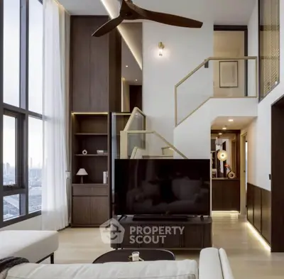 Luxurious modern living room with high ceilings, large windows, and elegant wooden finishes.