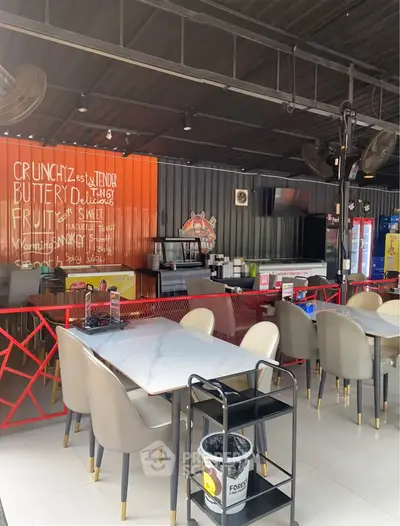 Trendy modern cafe with stylish decor and vibrant seating area
