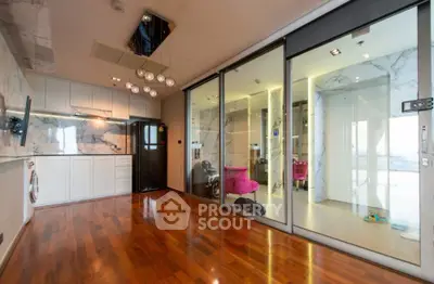 Luxurious modern living room with marble accents and sleek wooden flooring