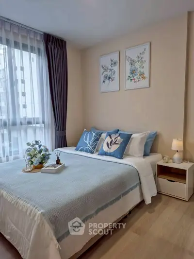 Cozy bedroom with elegant decor and natural light