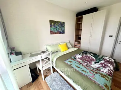 Cozy bedroom with modern decor and ample storage space