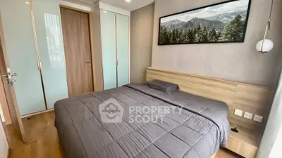 Modern bedroom with stylish decor and wooden accents