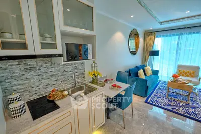Modern open-layout kitchen and living room with stylish decor and natural light
