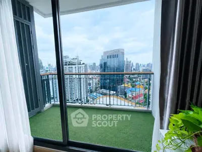 Stunning city view from a modern balcony with artificial grass flooring, perfect for relaxation.
