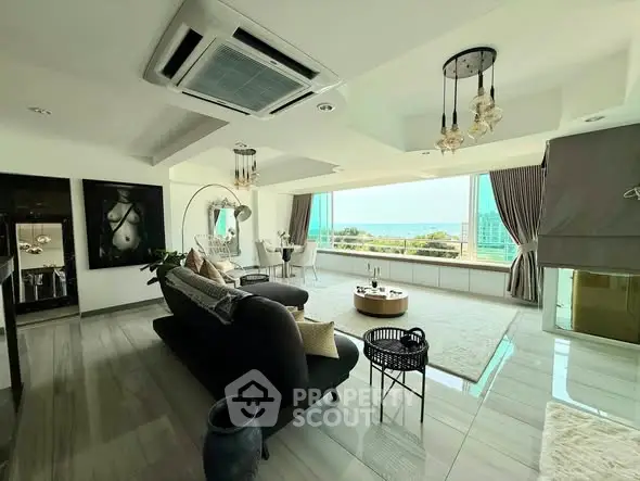 Luxurious living room with panoramic ocean view and modern decor