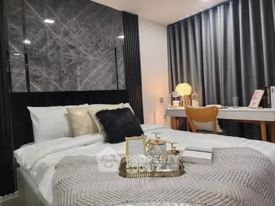 Luxurious bedroom with elegant decor and cozy ambiance, featuring a stylish bed and modern furnishings.