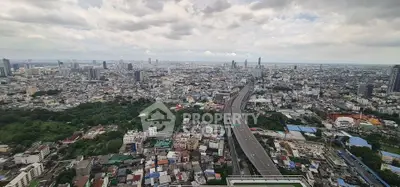 Stunning cityscape view from high-rise building showcasing urban skyline and expansive city layout.
