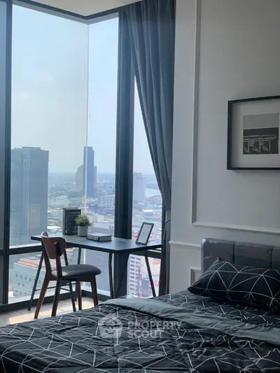 Modern bedroom with stunning city view and stylish decor