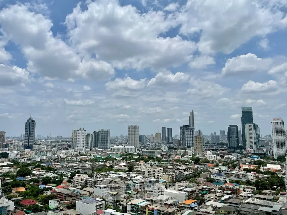 Stunning cityscape view showcasing a vibrant urban skyline under a picturesque sky.