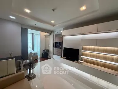 Modern living room with sleek design and built-in entertainment center