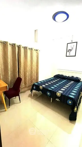 Cozy bedroom with modern decor and natural light