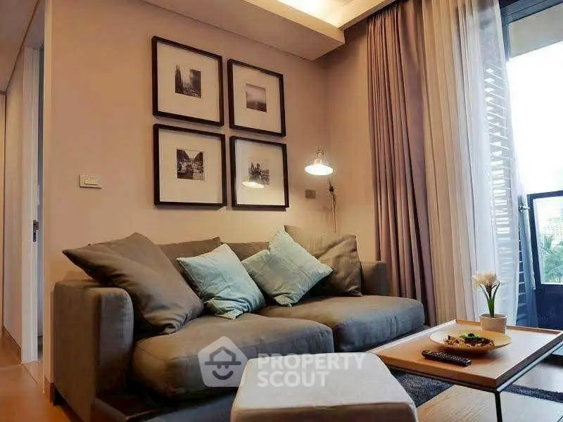 Cozy living room with stylish decor and comfortable seating, perfect for relaxation.