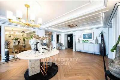 Luxurious living room with elegant decor and marble table in upscale apartment