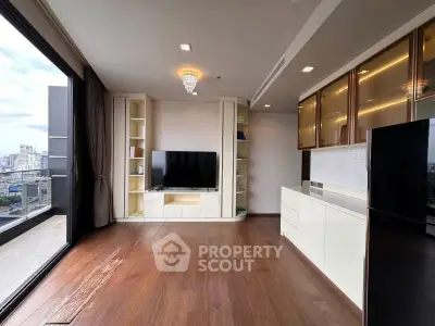 Spacious modern living room with city view and elegant wooden flooring