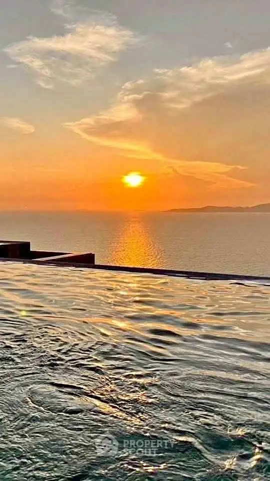 Stunning infinity pool with breathtaking sunset ocean view